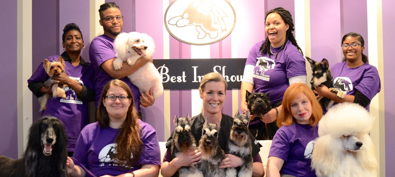 The Best In Show team with client dogs at the Cascade Road salon